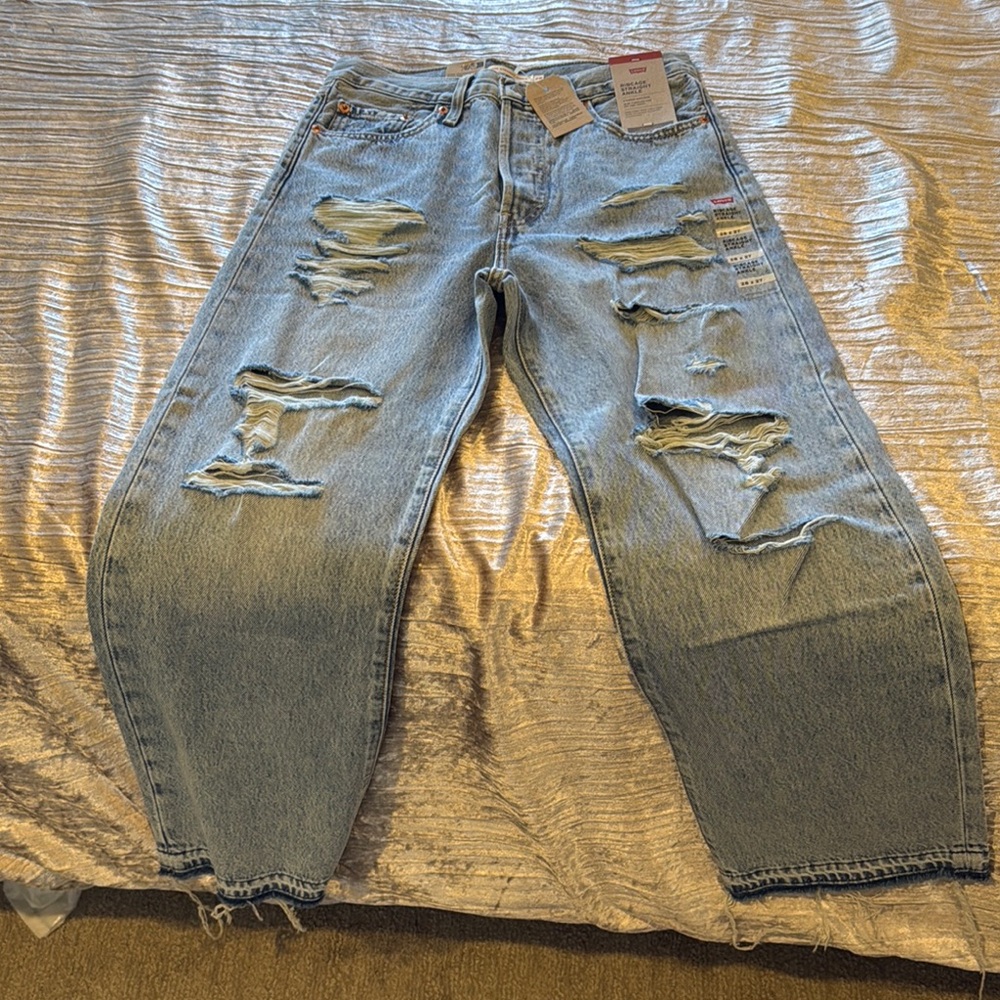 Light Blue Distressed Relaxed Jeans with Frayed Hems